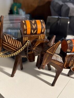 Hand-Carved Wooden Donkey Figurines with Orange Accents
